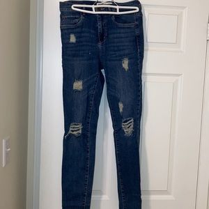 Garage Distressed ultra high rise skinny jeans
